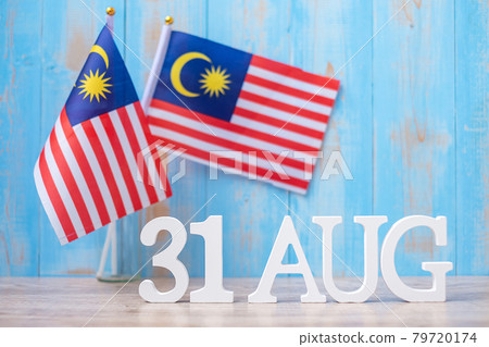 Wooden text of August 31 with Malaysia flags. Malaysia Independence day Wooden text of August 31 with Malaysia flags. Malaysia Independence day 79720174