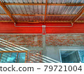 The bricks house wall with shining light and shadow. 79721004