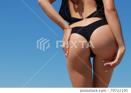 Slim woman with perfect body on beach 79722195