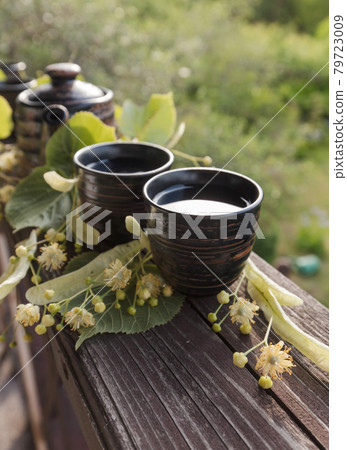 Linden tea and flowers. 79723009