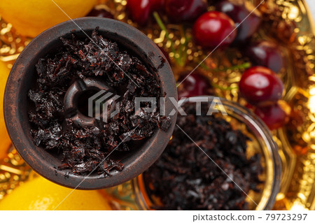 Shisha parts with fresh cherry close up Shisha parts with fresh cherry close up 79723297