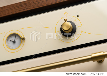 Modern oven mode control button close up Modern oven mode control button close up 79723495