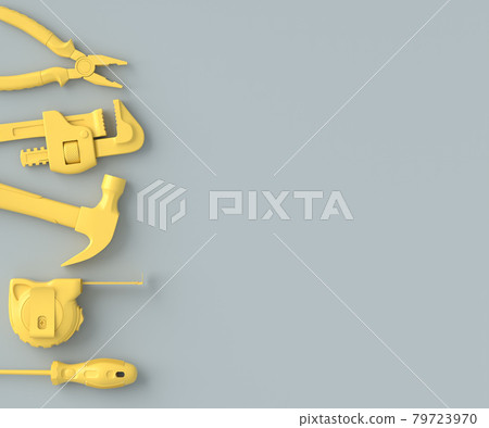 Top view of monochrome construction tools for repair on grey and yellow 79723970