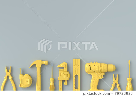 Top view of monochrome construction tools for repair on grey and yellow Top view of monochrome construction tools for repair on grey and yellow 79723983