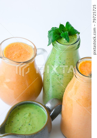 Seasonal Matcha green vegan smoothie with chia seeds and mint pumpkin carrot smoothie drink detox Breakfast. Clean eating, weight loss, healthy dieting food concept Seasonal Matcha green vegan smoothie with chia seeds and mint pumpkin carrot smoothie drink detox Breakfast. Clean eating, weight loss, healthy dieting food concept 79725725