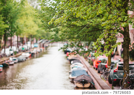 Beautiful canal in the old city of Amsterdam, Netherlands, North Holland province. Beautiful canal in the old city of Amsterdam, Netherlands, North Holland province. 79726083