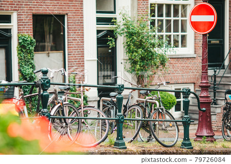 Traditional dutch medieval houses in Amsterdam capital of Netherlands Traditional dutch medieval houses in Amsterdam capital of Netherlands 79726084
