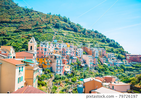 Beautiful cozy bay with boats and clear turquoise water in Italy Beautiful cozy bay with boats and clear turquoise water in Italy 79726197