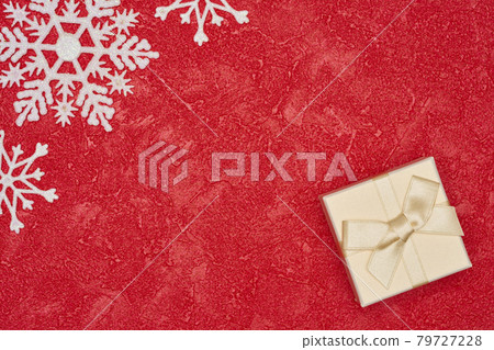 Christmas image and present box on red background 79727228