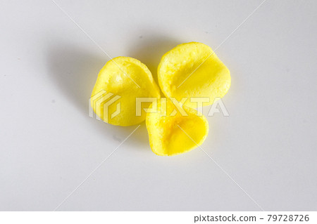 Fried chips in sweet corn flavour ,snack food. 79728726