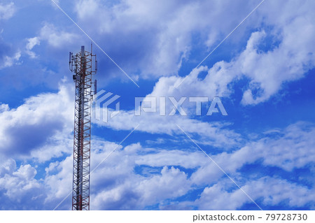 Telecommunication tower with antennas with blue sky and cloudy. Telecommunication tower with antennas with blue sky and cloudy. 79728730