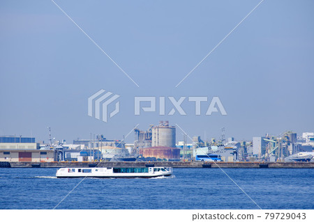 Maritime bus traveling through the industrial area Maritime bus traveling through the industrial area 79729043
