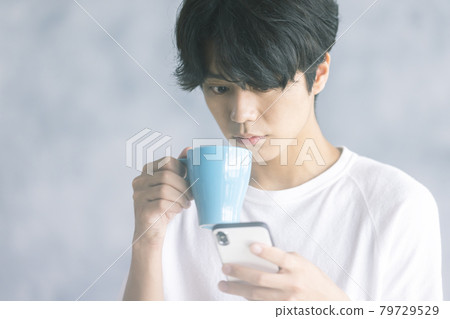 Young man lifestyle smartphone 79729529