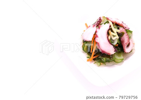 Octopus vinegared cucumber wakame seaweed bright background Octopus vinegared cucumber wakame seaweed bright background 79729756
