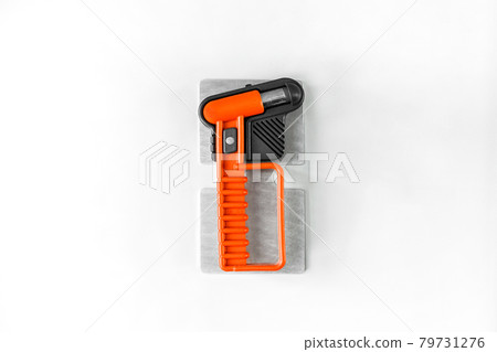 Firefighter red hammer to break glass on the white wall background in modern electric train Firefighter red hammer to break glass on the white wall background in modern electric train 79731276