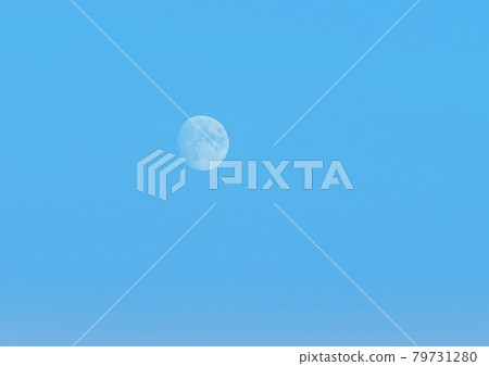 Moon or white planet on blue evening sky at dusk background Moon or white planet on blue evening sky at dusk background 79731280