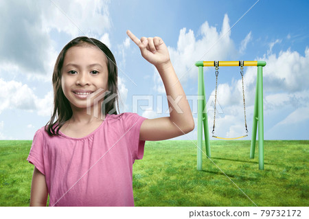 Asian little girl raised hands with swing Asian little girl raised hands with swing 79732172