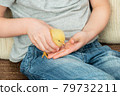 chick in children hands, close-up 79732211