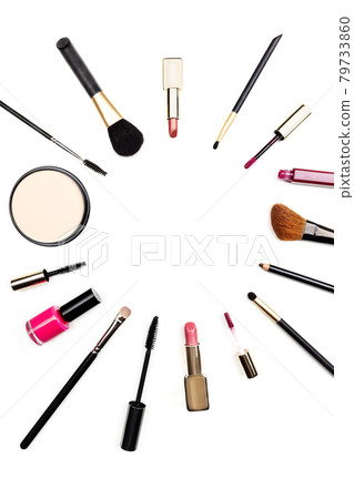 Makeup accessories forming frame with copy space on white 79733860