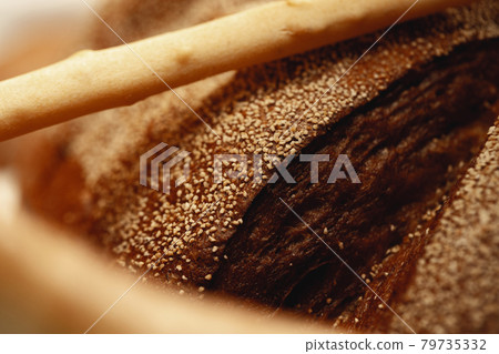 Macro shot of freshly baked bread loaf Macro shot of freshly baked bread loaf 79735332