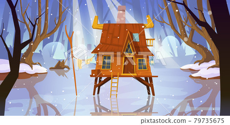 Wood stilt house at frozen swamp in winter forest 79735675