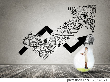 Businesswoman trapped in bulb Businesswoman trapped in bulb 79737371