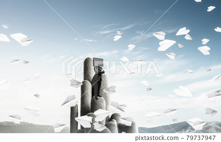 Businessman with TV instead of head. 79737947