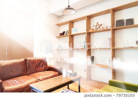 Indoor waiting room with sofa and open shelves Living image 79738103