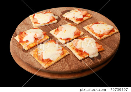 Pizza with smoked salmon and cream cheese, focus selective. 79739597
