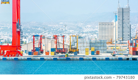 Shipping container carriers in cargo terminal of Limassol (Cyprus) port Shipping container carriers in cargo terminal of Limassol (Cyprus) port 79743180