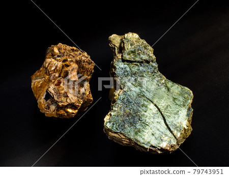 Shiny green muscovite mica mineral sheet isolated on black. Found in Miass, Ural, Russia. For geology mineralogy magazines websites article, Natural Science museum wall chart, stone collection catalog 79743951