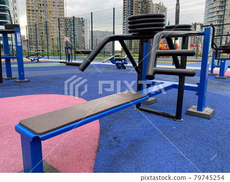 Close up outdoors gym equipment at the park sports ground. Different machines for training, activity at workout space 79745254