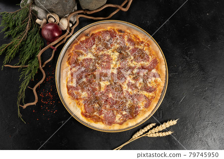 Pizza with bacon and parmesan cheese 79745950