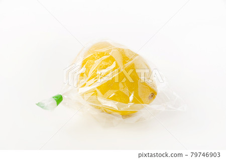 Lemon in a plastic bag Lemon in a plastic bag 79746903