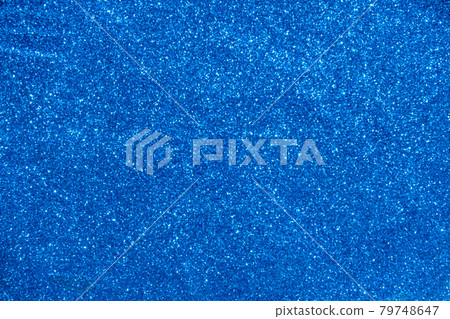 Blue shimmering glitter as texture or background. Bright festive backdrop Blue shimmering glitter as texture or background. Bright festive backdrop 79748647