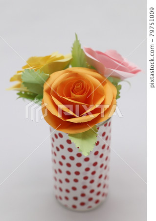 Handmade rose flowers made from origami Handmade rose flowers made from origami 79751009