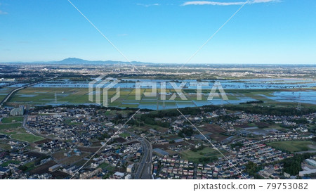 Overflowing typhoon, flooding Tone River and sunken fields [Aerial view] 79753082
