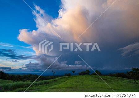 White clouds floating in the blue sky in summer Landscape of the meadow of Oshito stone White clouds floating in the blue sky in summer Landscape of the meadow of Oshito stone 79754374