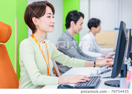 A scene where office staff perform desk work A scene where office staff perform desk work 79754435