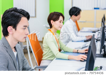 A scene where office staff perform desk work A scene where office staff perform desk work 79754436