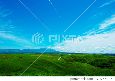 View of the Yamanami Highway and Kuju Mountain Range from the grasslands of Aso Outer Ring View of the Yamanami Highway and Kuju Mountain Range from the grasslands of Aso Outer Ring 79756927