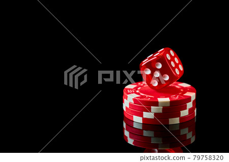 Red casino dice and chips isolated over black reflective background Red casino dice and chips isolated over black reflective background 79758320