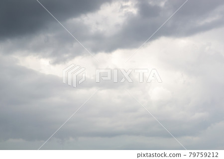 Dark storm clouds before rain. The concept of a threat, an ominous warning. Use as texture, background 79759212