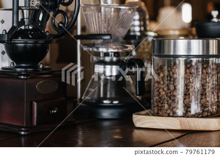 Vintage hand coffee grinders in a coffee shop. Classic cafe, Selective Focus. Vintage hand coffee grinders in a coffee shop. Classic cafe, Selective Focus. 79761179