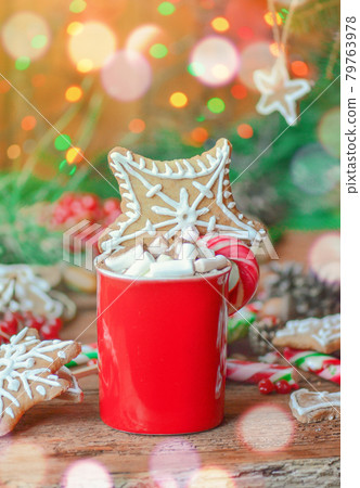 Cacao with marshmallows and Christmas cookies Cacao with marshmallows and Christmas cookies 79763978