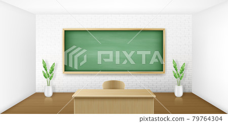 Classroom with green blackboard on wall and table 79764304