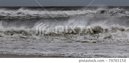Rough dangerous ocean waves during a storm Rough dangerous ocean waves during a storm 79765158