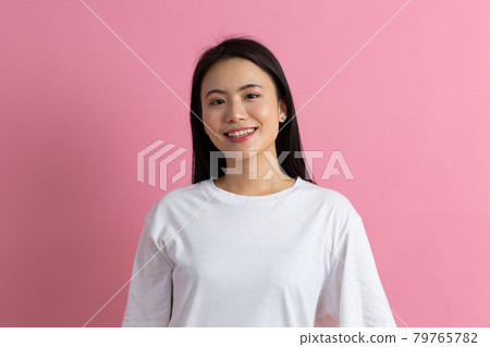 Portrait of asian woman on pink background 79765782