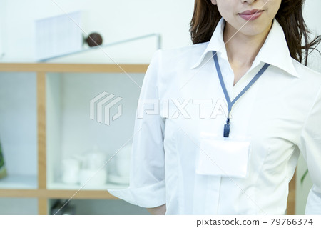Business woman with a nameplate Business woman with a nameplate 79766374
