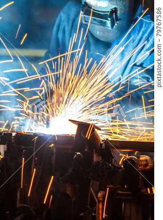 worker with protective mask welding metal worker with protective mask welding metal 79767586